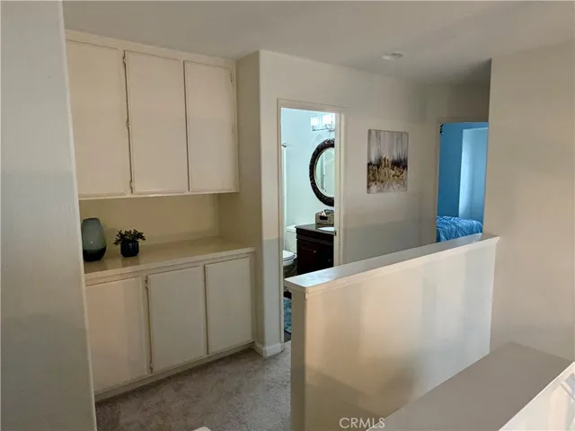 upstairs hall to bathroom and two bedrooms