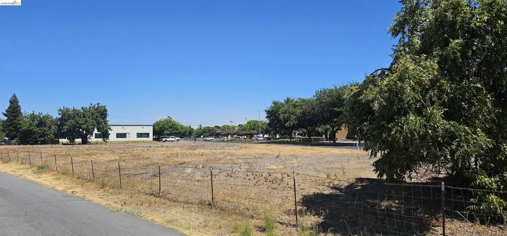 View of asphalt street featuring a rural view