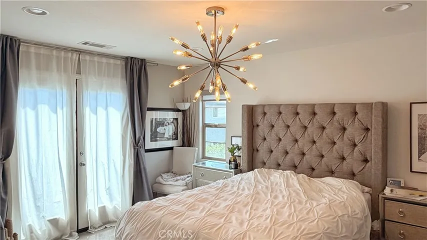 Bedroom with designer chandelier lighting, 11908 Nixon Lane Whittier CA 90601
