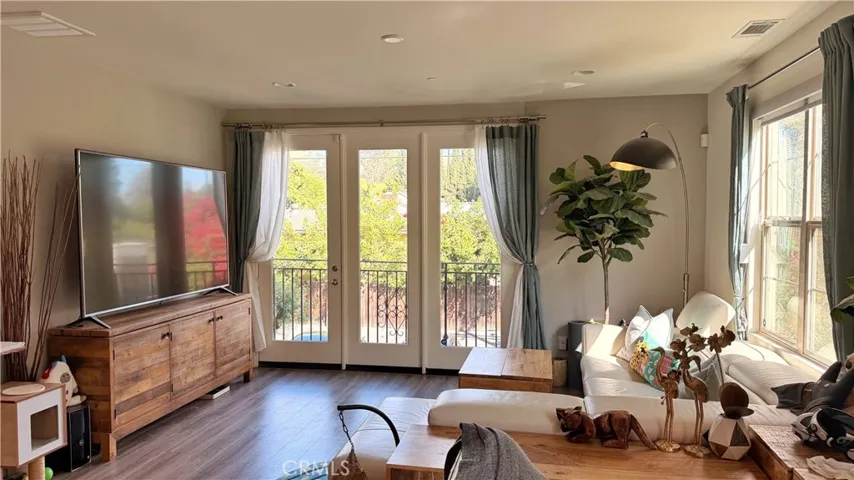 Open-concept living and dining area with natural light, 11908 Nixon Lane Whittier CA 90601
