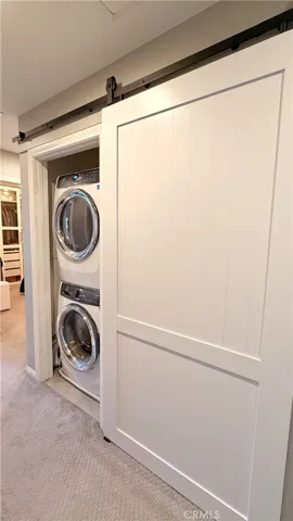 Upstairs laundry room with barn door, The Heights on Beverly Whittier CA 90601
