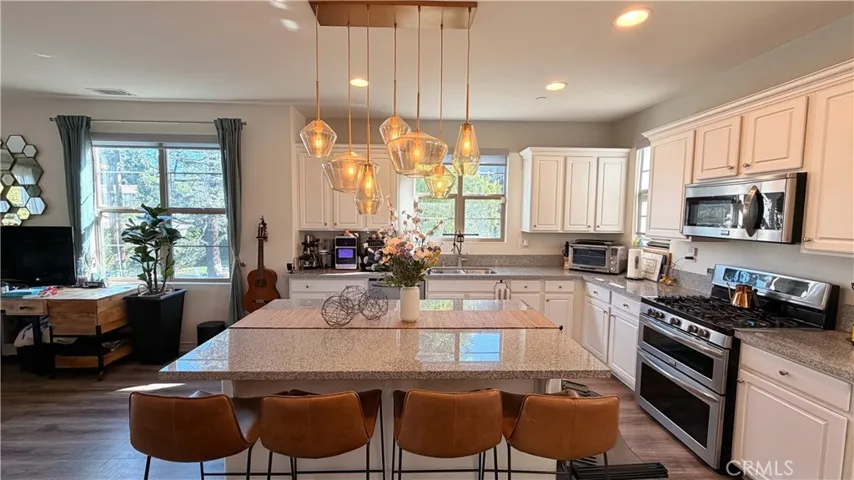 Kitchen island seating and designer pendant lighting, 3 bed 3 bath end unit Whittier CA for sale
