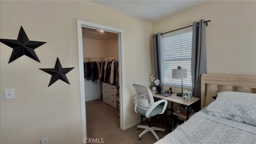 bedroom 2 with walk in closet