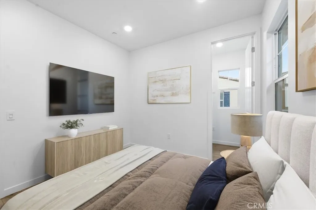 3rd Level Secondary Bedroom PHOTOS ARE OF MODEL MATCH AND HAVE BEEN VIRTUALLY STAGED - EXTERIOR AND INTERIOR FINISHES MAY VARY