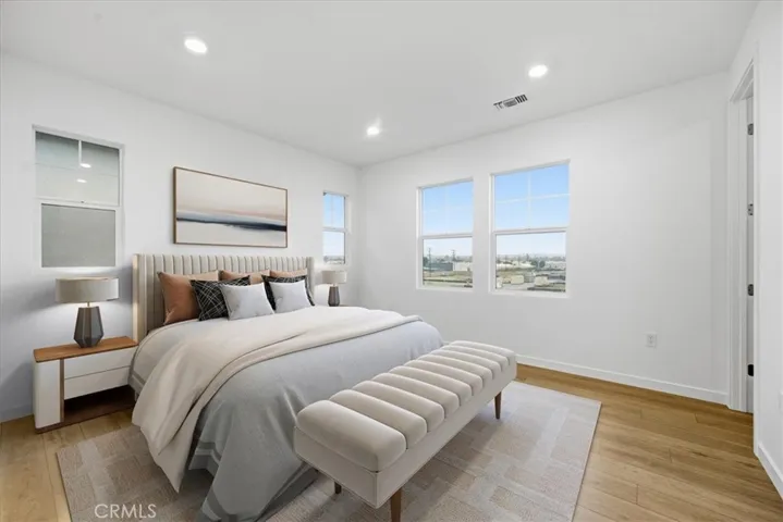 3rd Level Primary Suite PHOTOS ARE OF MODEL MATCH AND HAVE BEEN VIRTUALLY STAGED - EXTERIOR AND INTERIOR FINISHES MAY VARY