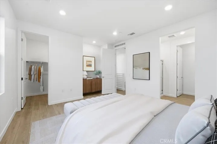 3rd Level Primary Suite PHOTOS ARE OF MODEL MATCH AND HAVE BEEN VIRTUALLY STAGED - EXTERIOR AND INTERIOR FINISHES MAY VARY