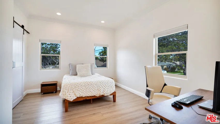 A second bedroom with views of
