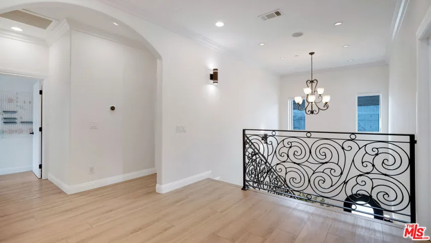 Pass the beautiful stairway.