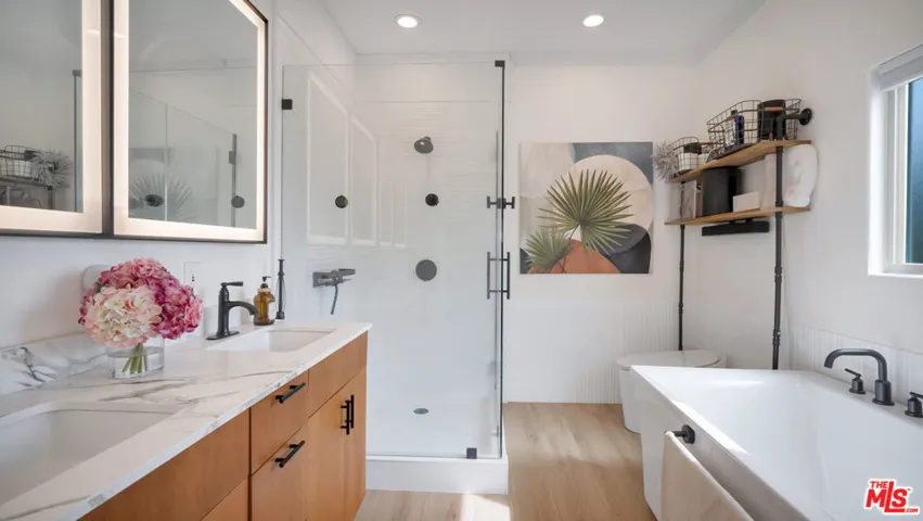 Double sink, bathtub, toilet a