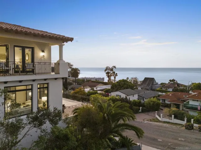 Elevated coastal setting with panoramic ocean views, where the home captures both the horizon and the surrounding hillside, creating a sense of privacy, openness, and effortless connection to the sea.