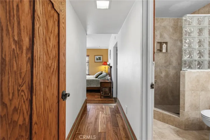 Hallway to Private Primary Bathroom and Bedroom