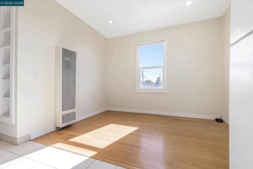 Open Layout Living/Dining Area - NOT Virtually Staged