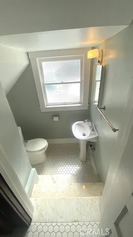 Powder Room between Entry Hall & Kitchen