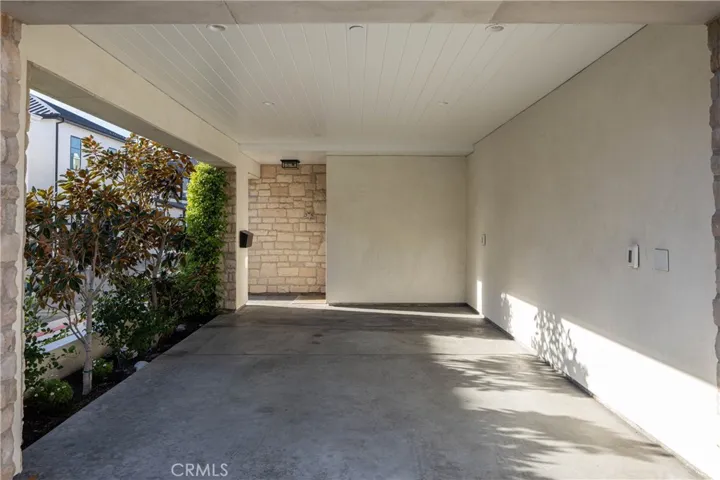 Car port in addition to three garage spaces