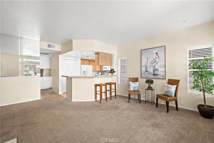 Open floorplan, bar sitting at kitchen counter