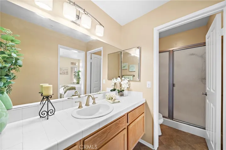 Primary bath has a walk in shower
