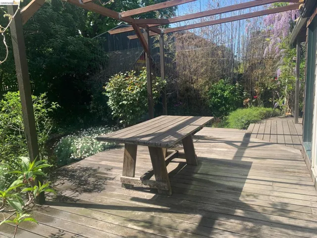 Wooden terrace with outdoor dining space