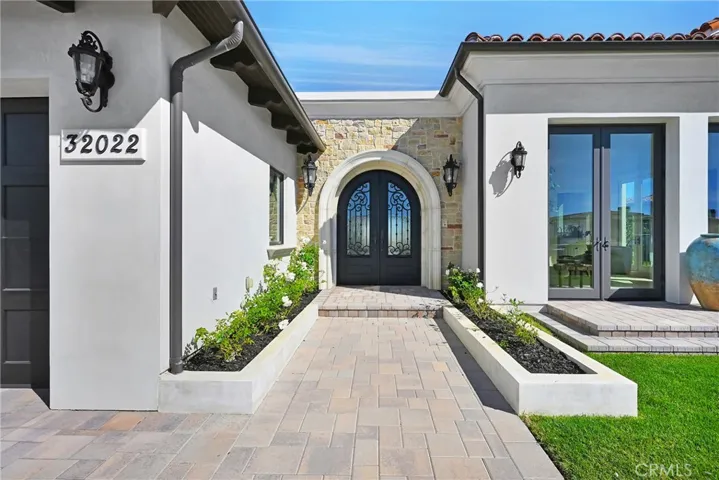 Custom Iron Doors at Front Entrance