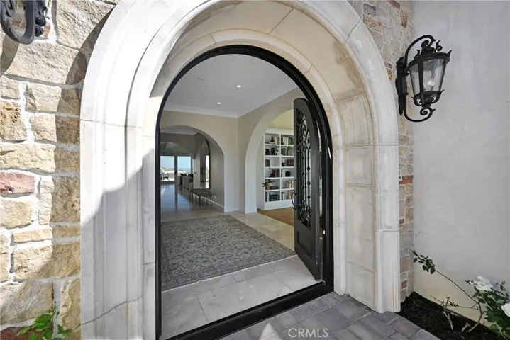 Ocean Views Draw You In From The Moment You Enter This Elegant Home