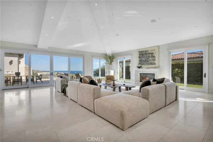 Great Room with Ocean Views, Sliding Doors to Patio & Side Yard, Custom Automated Shades