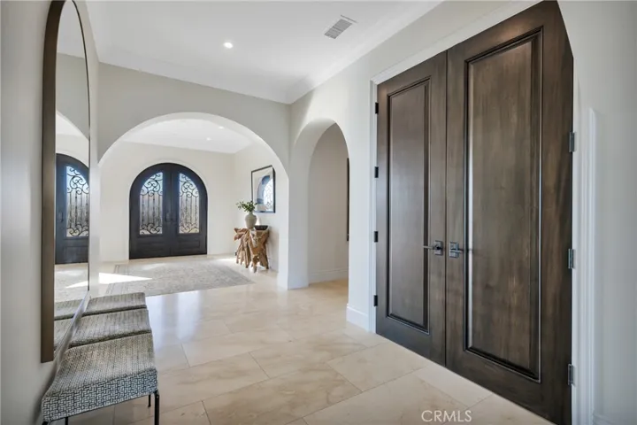 Entry Hall with Coat Closet And Access To Guest Wing