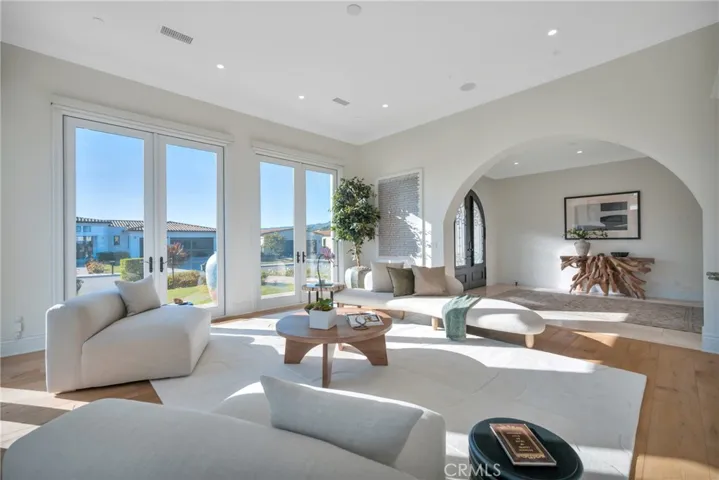 Living Room with Custom Automated Shades For Privacy