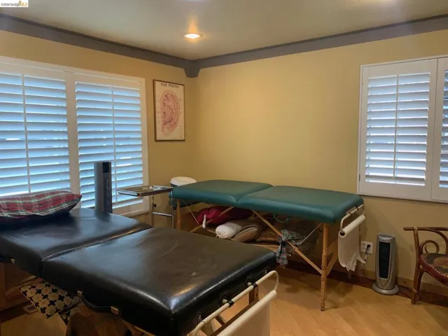 Bedroom featuring light wood-style flooring and recessed lighting