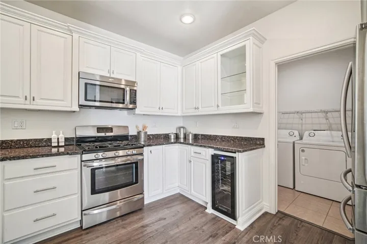 Kitchen with new wine cooler, lots of storage, built in refridgerator