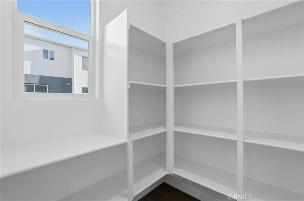 Large walk-in Pantry w/window PHOTOS ARE OF MODEL MATCH AND HAVE BEEN VIRTUALLY STAGED. INTERIOR AND EXTERIOR FINISHES MAY VARY