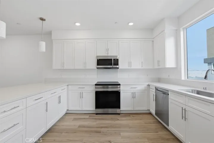 Large Gourmet Kitchen w/Oversized window over sink PHOTOS ARE OF MODEL MATCH AND HAVE BEEN VIRTUALLY STAGED. INTERIOR AND EXTERIOR FINISHES MAY VARY