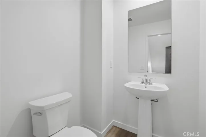2nd Level Powder Room PHOTOS ARE OF MODEL MATCH AND HAVE BEEN VIRTUALLY STAGED. INTERIOR AND EXTERIOR FINISHES MAY VARY