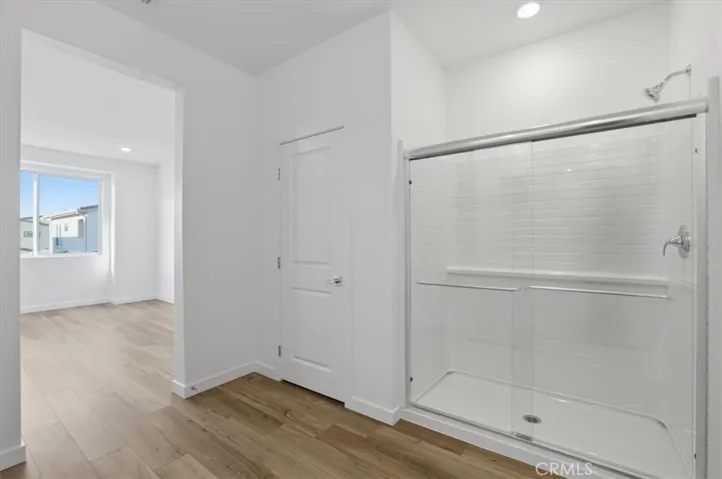 Primary En-suite Walk- in Shower PHOTOS ARE OF MODEL MATCH AND HAVE BEEN VIRTUALLY STAGED. INTERIOR AND EXTERIOR FINISHES MAY VARY