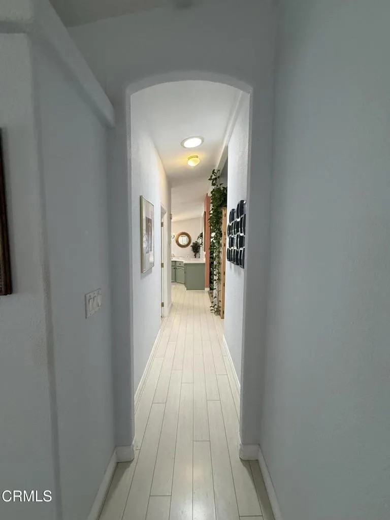 View down the hall to laundry area