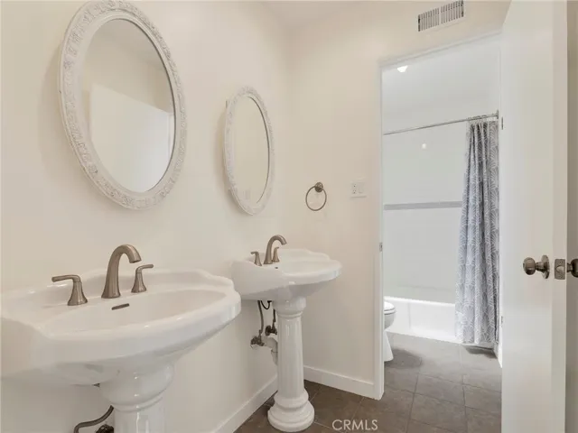 Upstairs Hollywood Bathroom - Dual Pedestal Vanities