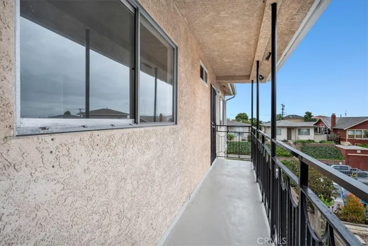 Overlooks neighborhood & has more natural light