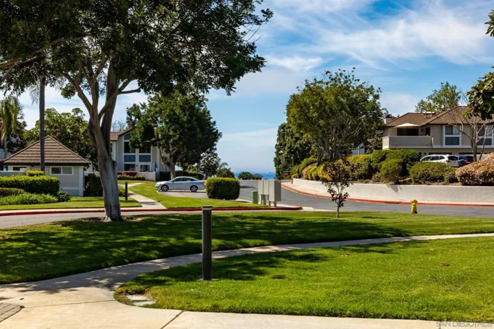 Peek-a-boo ocean view from exterior front.