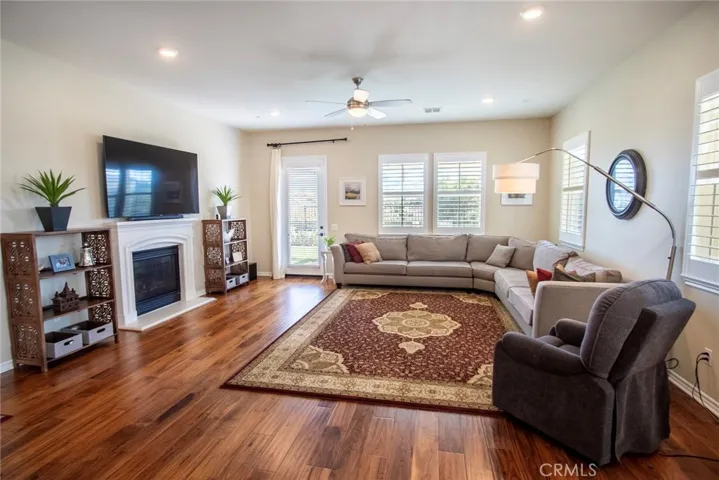 Nice size family room featuring cozy fireplace
