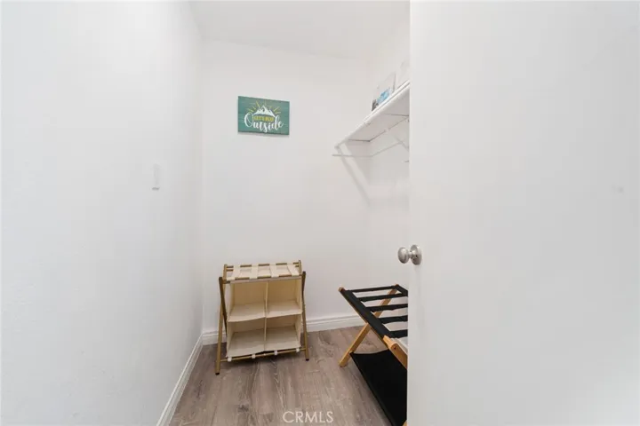 Large walk in closet in downstairs bedroom.