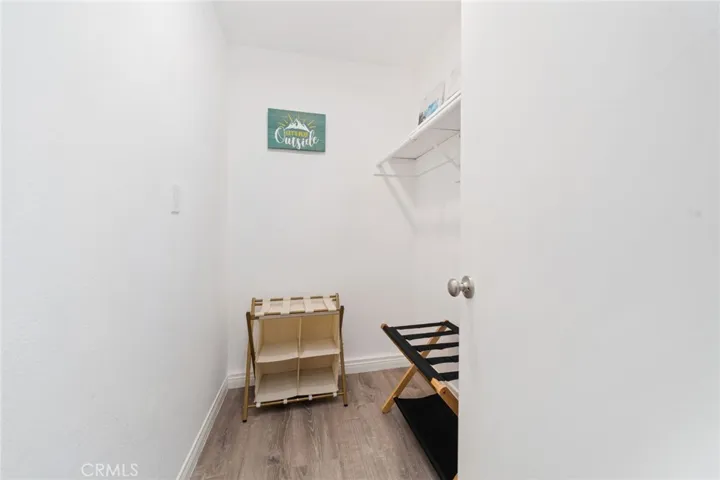 Large walk in closet in downstairs bedroom.