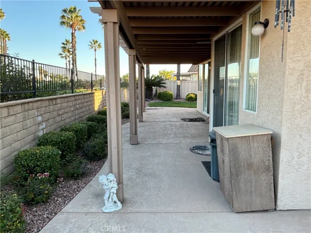 Large covered patio off kitchen, dining, & master bedroom.