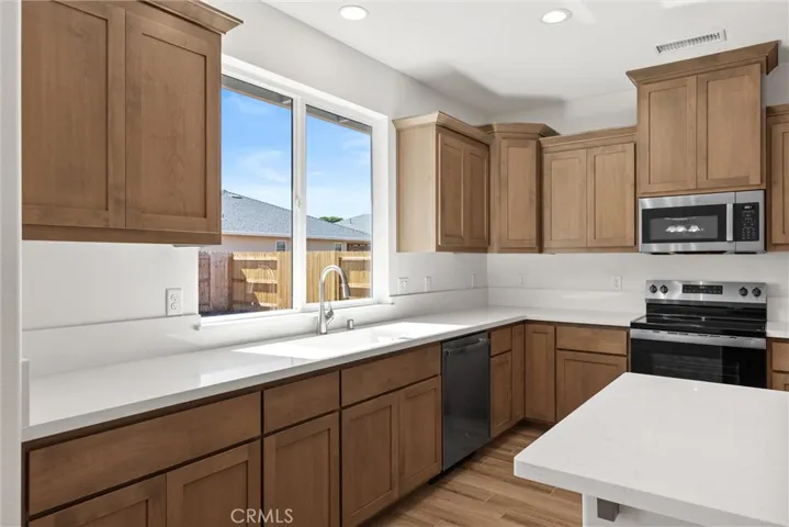 Photo is of a previously completed home of the same floorplan.