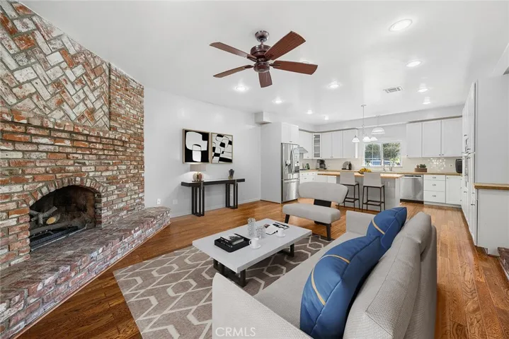 Family room to kitchen view- virtually enhanced