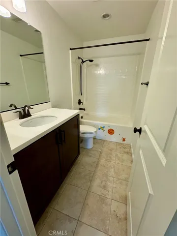 Hallway full bathroom serves bedrooms 1 and 2 and is nicely appointed with oil rubbed bronze hardware throughout.