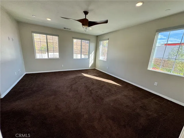 The Primary Bedroom suite is luxurious and roomy as it is the size of the living room, dining room, and kitchen downstairs!  In addition, the suite is overlooking the backyard so it could not be quieter and relaxing.