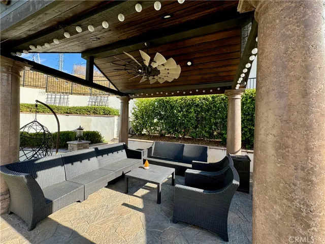 Relax and read a book in this covered patio or entertain family and friends.