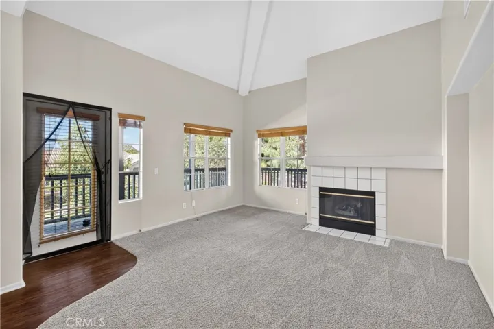 Door leads to L-shaped balcony