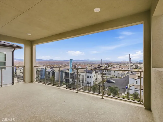 Primary Bedroom Balcony View: Merle - Skylar II Collection at Valencia FivePoint - Homesite 30