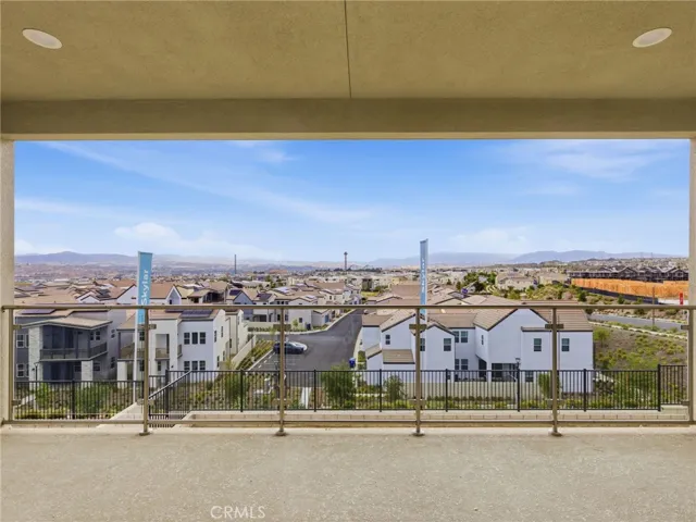 Primary Bedroom Balcony View: Merle - Skylar II Collection at Valencia FivePoint - Homesite 30