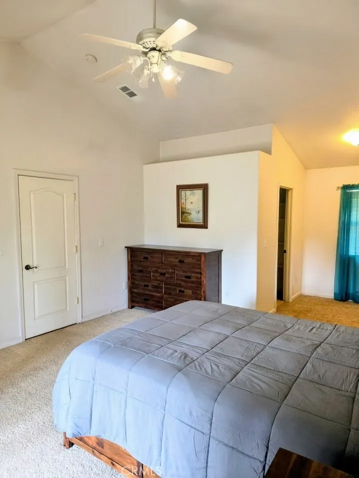 MASTER BEDROOM WITH CEILING FAN