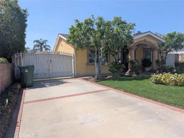 Left side of house.